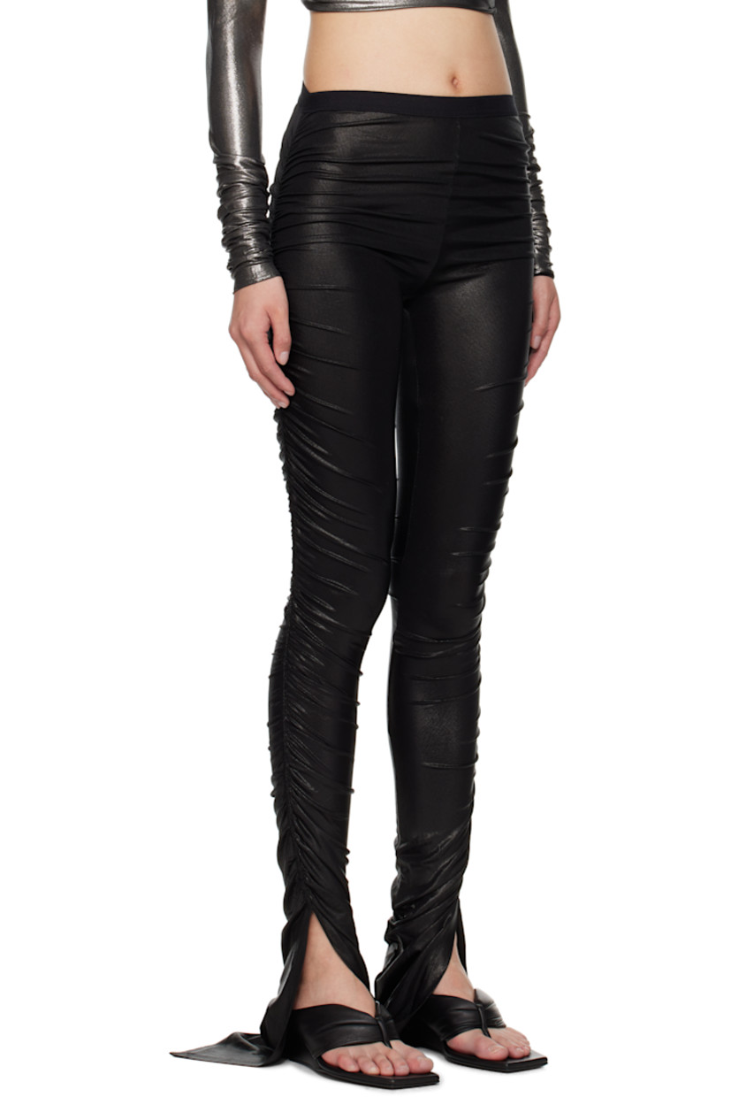 Foil-coated stretch viscose jersey leggings.

· FSC®-certified viscose
· Elasticized waistband
· Vent at cuffs
· Ruching at outseams

Supplier color: Black