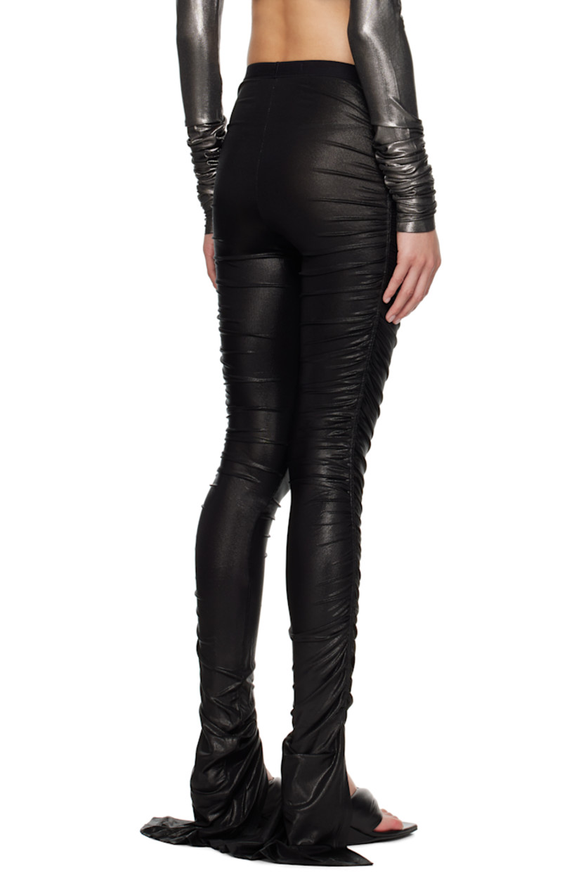 Foil-coated stretch viscose jersey leggings.

· FSC®-certified viscose
· Elasticized waistband
· Vent at cuffs
· Ruching at outseams

Supplier color: Black