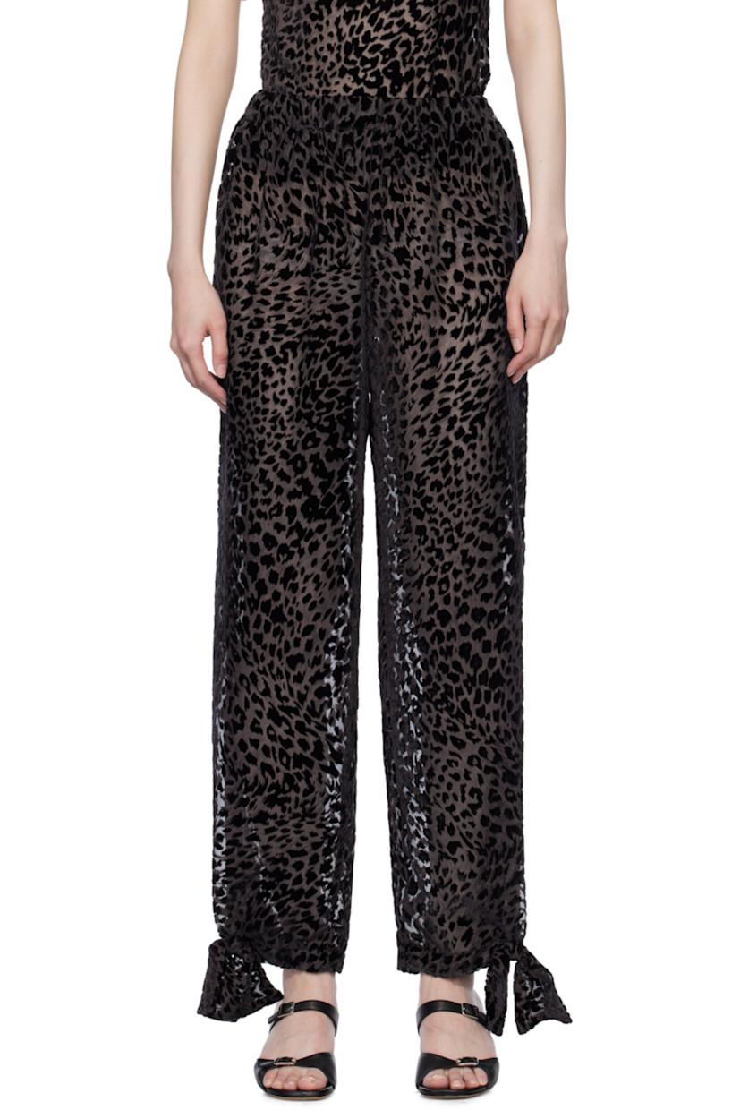 Semi-sheer viscose- and silk-blend chiffon trousers. Leopard pattern flocked throughout.

· Elasticized waistband
· Bow accent and press-stud fastening at cuffs

Supplier color: Brown Black