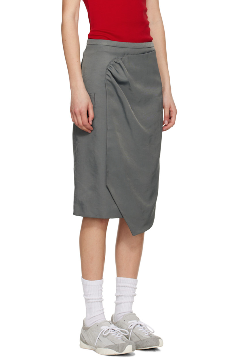 Nylon twill midi skirt.

· Wrap construction
· Two-pocket styling
· Gathering at front
· Belt loop slits at front and back
· Asymmetrical hem
· Frayed logo flag at back
· Central vent and raw edge at back hem
· Partial satin lining

Supplier color: Charcoal