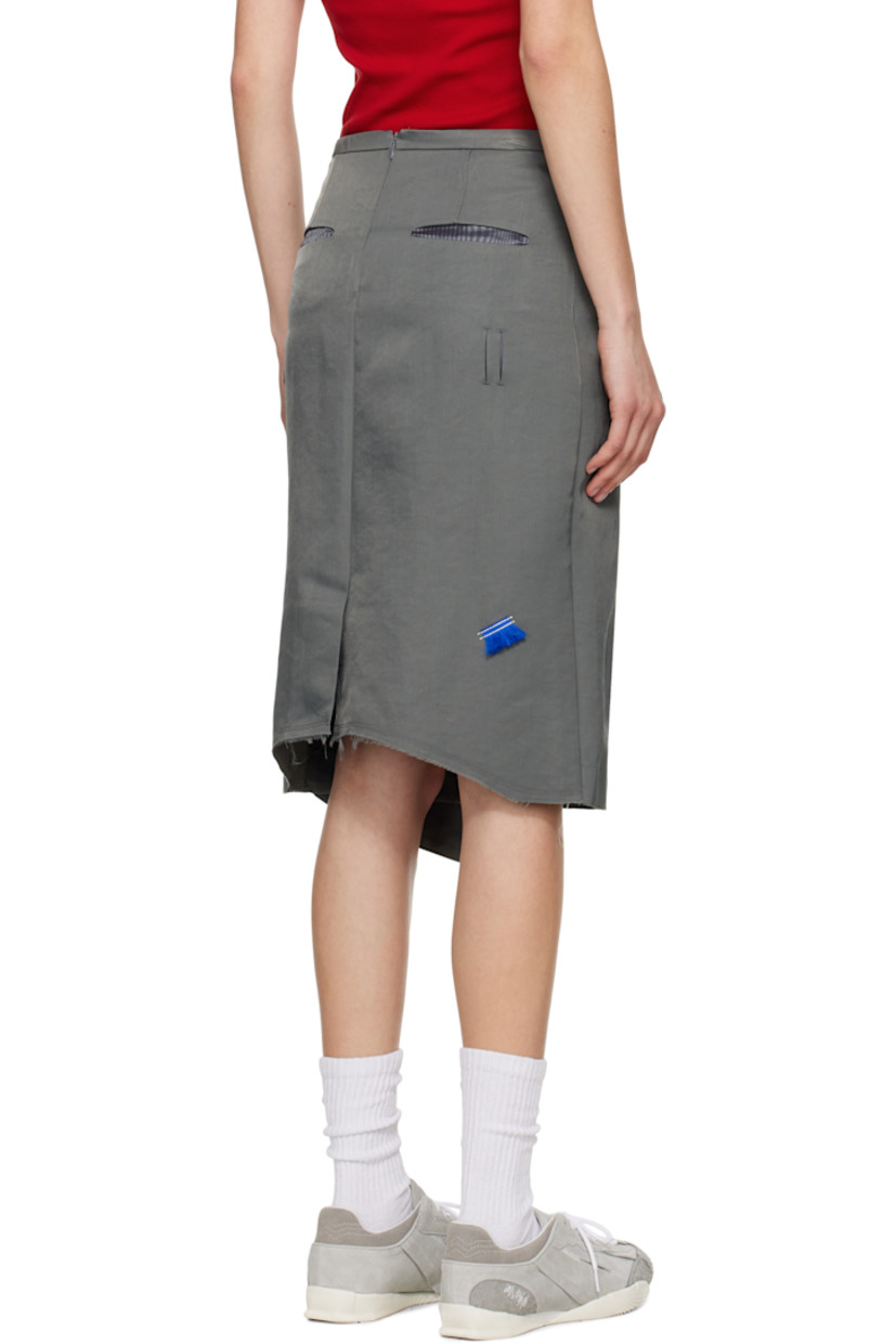 Nylon twill midi skirt.

· Wrap construction
· Two-pocket styling
· Gathering at front
· Belt loop slits at front and back
· Asymmetrical hem
· Frayed logo flag at back
· Central vent and raw edge at back hem
· Partial satin lining

Supplier color: Charcoal