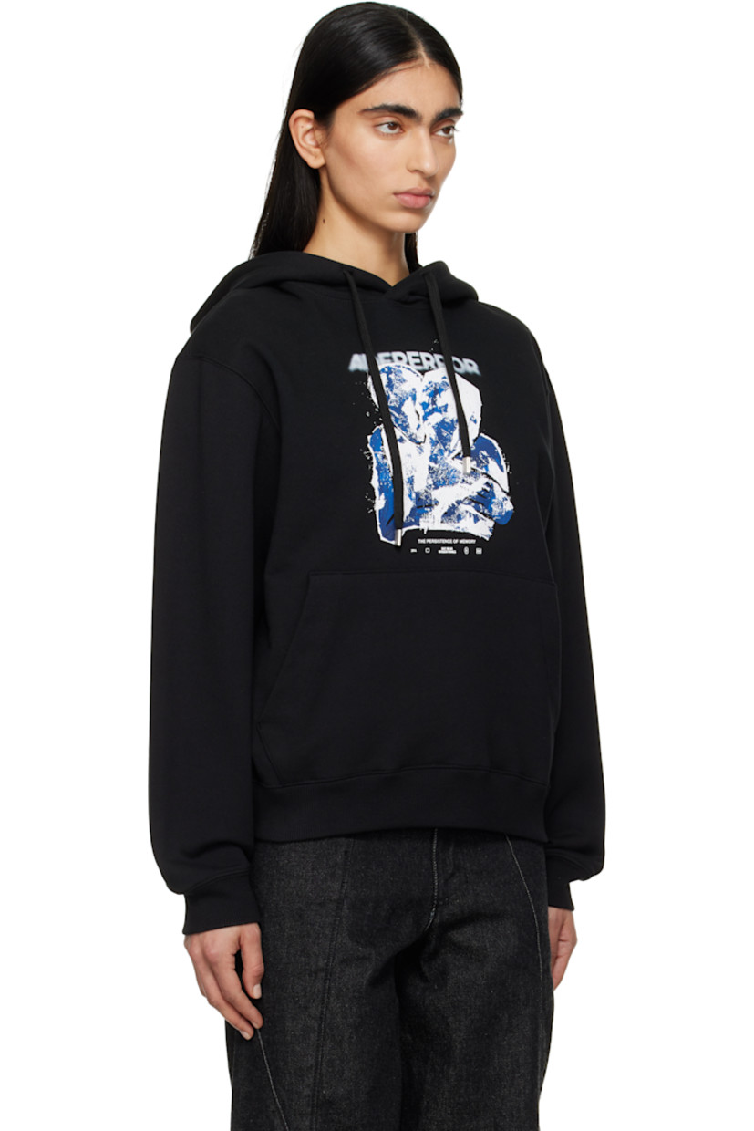 French terry hoodie.

· Drawstring at hood
· Logo and text printed at chest
· Graphic bonded at chest
· Kangaroo pocket
· Rib-knit hem and cuffs
· Dropped shoulders
· Frayed logo flag with topstitching at back

Supplier color: Noir
