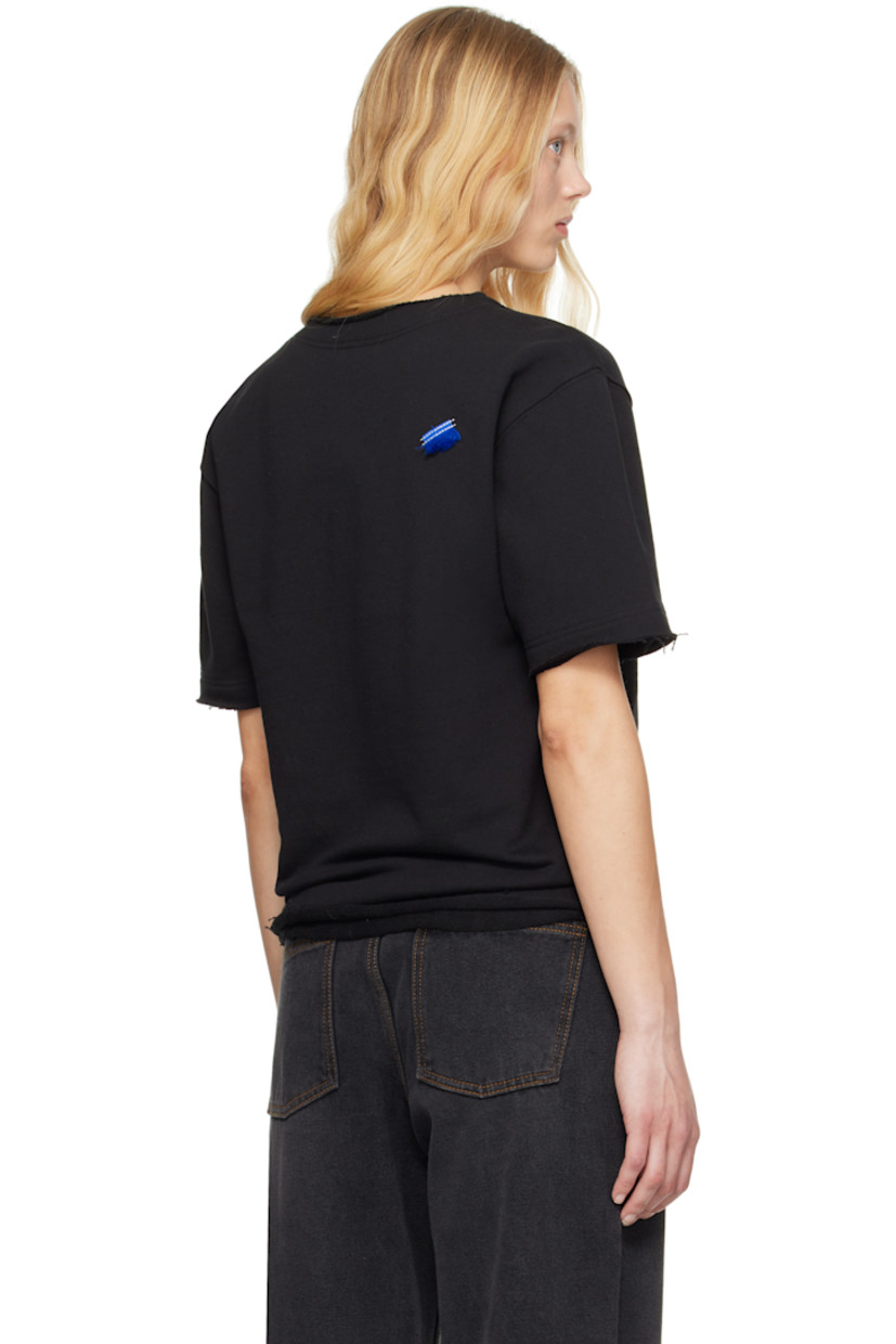 French terry sweatshirt. Raw edges throughout. 

· Crewneck
· Hand-stitched logo plaque at chest
· Elasticized hem
· Frayed flag at back

Supplier color: Noir