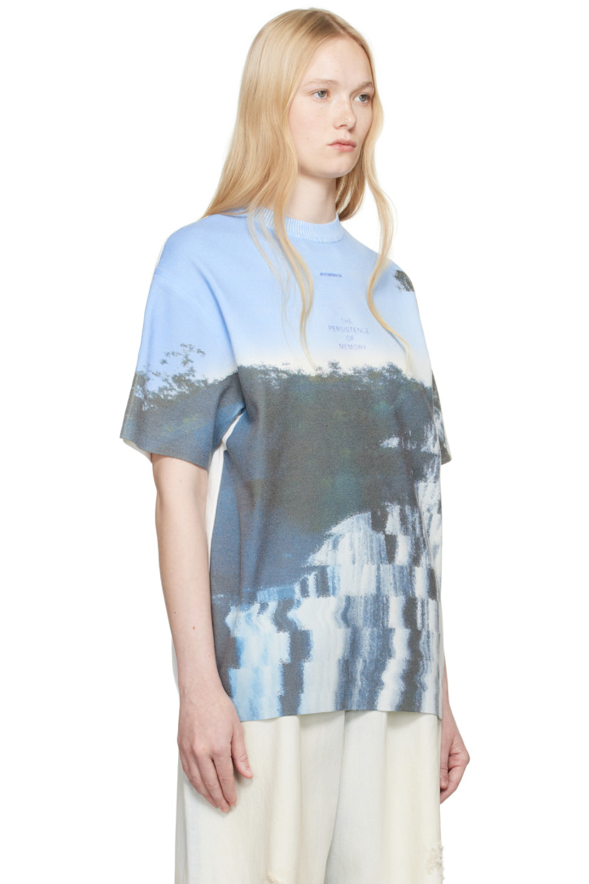 Knit cotton-blend T-shirt. 

· Rib-knit crewneck
· Graphic, logo, and text printed at chest
· Dropped shoulders
· Frayed flag with topstitching at back

Supplier color: Blue