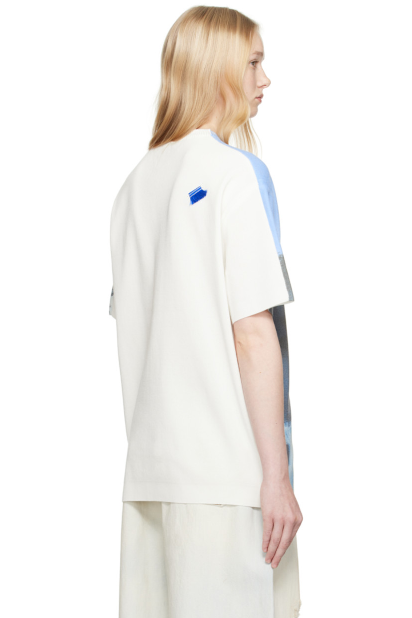 Knit cotton-blend T-shirt. 

· Rib-knit crewneck
· Graphic, logo, and text printed at chest
· Dropped shoulders
· Frayed flag with topstitching at back

Supplier color: Blue