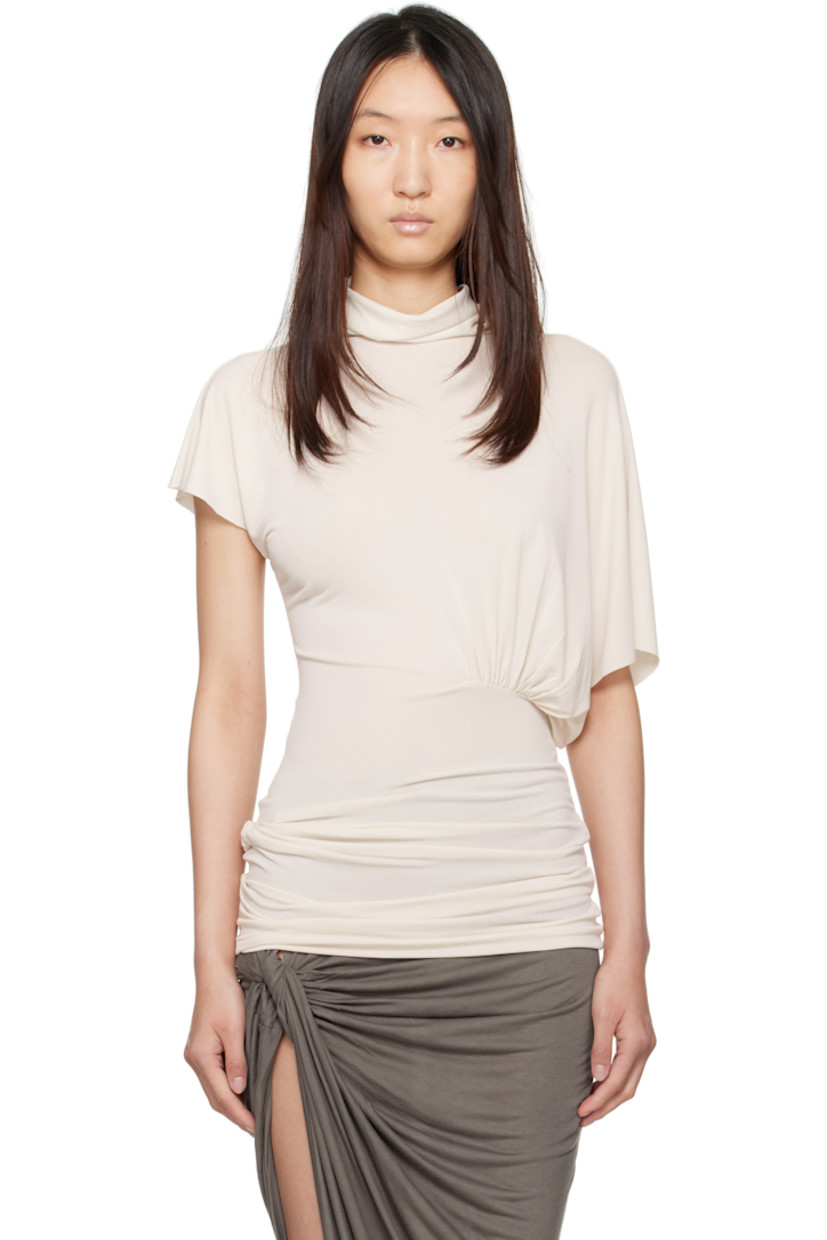 Semi-sheer stretch viscose-blend crêpe jersey top.

· FSC®-certified viscose
· Asymmetrical draped construction
· Cowl neck
· Ruching at waist
· Twisted detailing at hem
· Raw edge at hem and cuffs

Supplier color: Dove