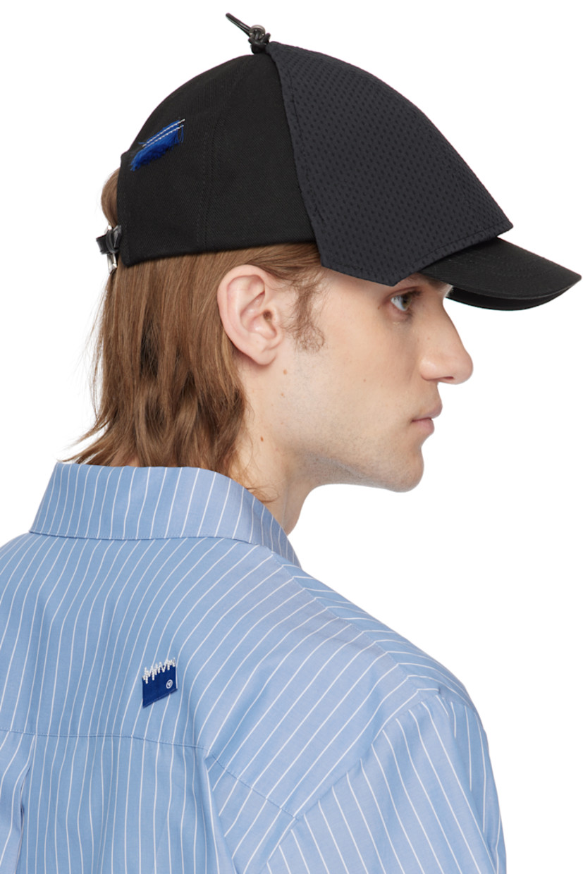 Cotton-blend twill cap in black. 

· Knotted detailing at crown
· Twill overlay at face 
· Frayed appliqué at back face 
· Leather pin-buckle fastening 
· Quilted browband
· Broadcloth lining
· Logo-engraved silver-tone hardware

Supplier color: Noir