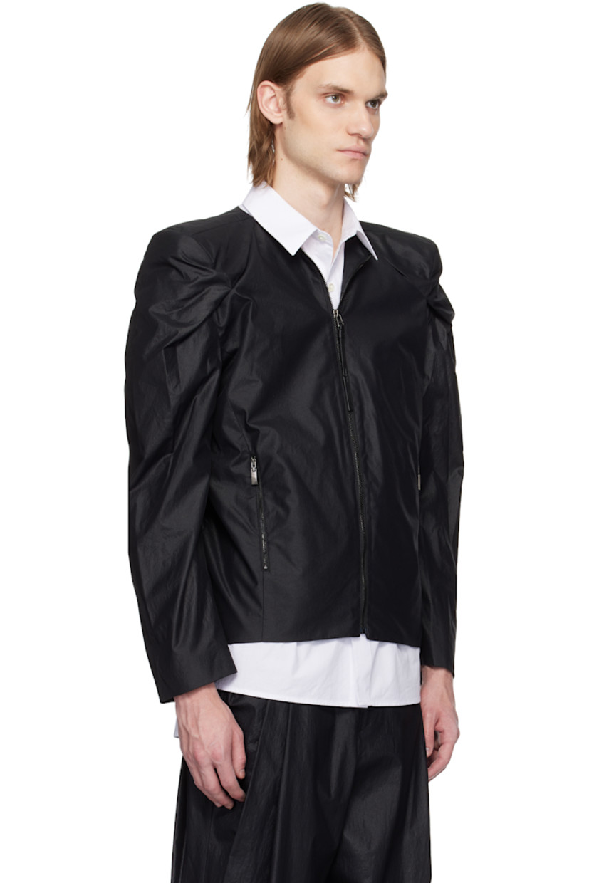 Stretch nylon-blend chintz jacket.

· Round neck
· Zip closure
· Logo-embossed leather zip pull
· Zip pockets
· Pleat at padded shoulders
· Frayed flag with topstitching at back
· Welt pocket at interior
· Full logo-woven satin lining
· Logo-engraved silver-tone hardware

Supplier color: Noir