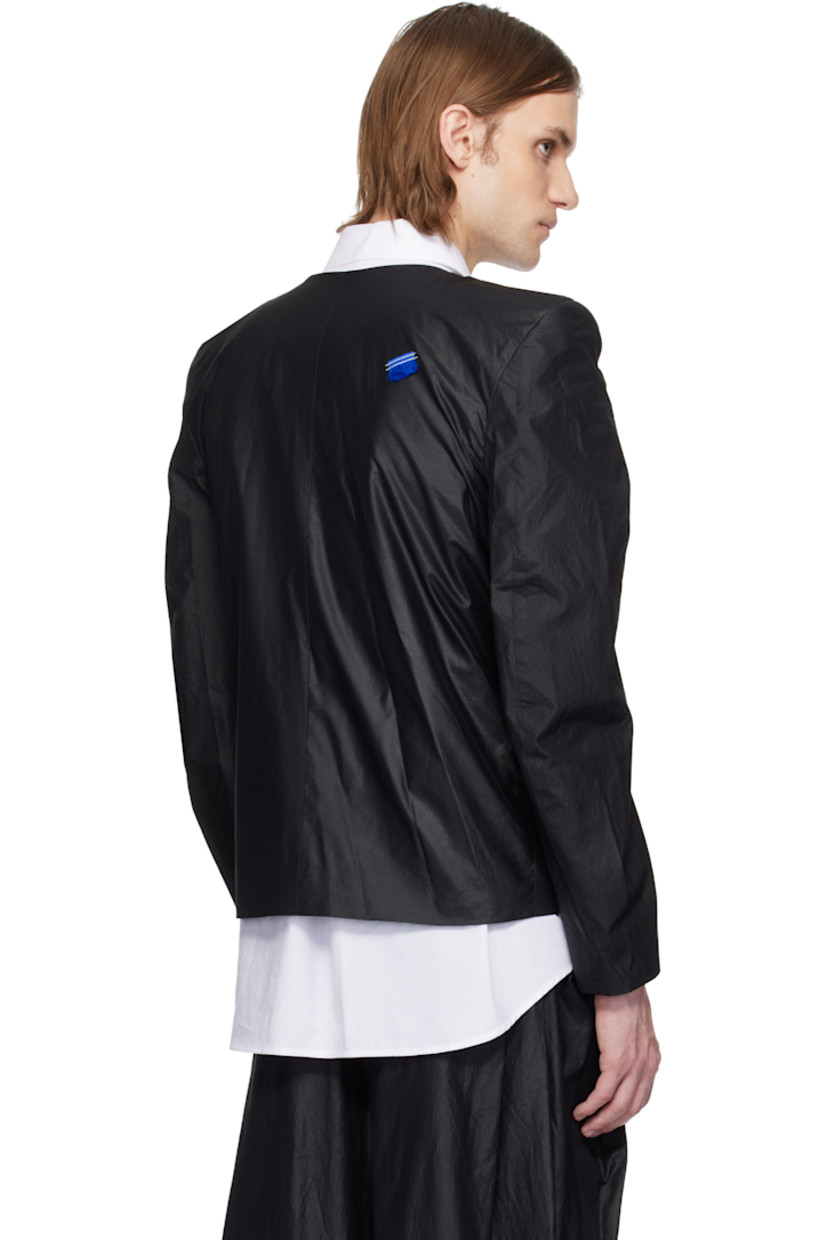 Stretch nylon-blend chintz jacket.

· Round neck
· Zip closure
· Logo-embossed leather zip pull
· Zip pockets
· Pleat at padded shoulders
· Frayed flag with topstitching at back
· Welt pocket at interior
· Full logo-woven satin lining
· Logo-engraved silver-tone hardware

Supplier color: Noir