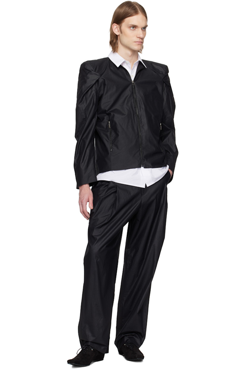 Stretch nylon-blend chintz jacket.

· Round neck
· Zip closure
· Logo-embossed leather zip pull
· Zip pockets
· Pleat at padded shoulders
· Frayed flag with topstitching at back
· Welt pocket at interior
· Full logo-woven satin lining
· Logo-engraved silver-tone hardware

Supplier color: Noir