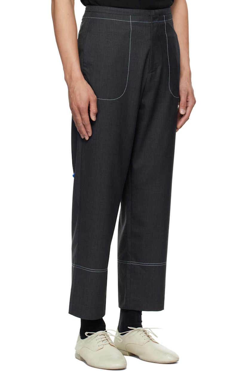 Wool-blend delaine trousers. 

· Mid-rise
· Four-pocket styling
· Zip fly
· Darts with topstitching at back waistband
· Frayed flag with topstitching at back
· Contrast stitching in white

Supplier color: Grey