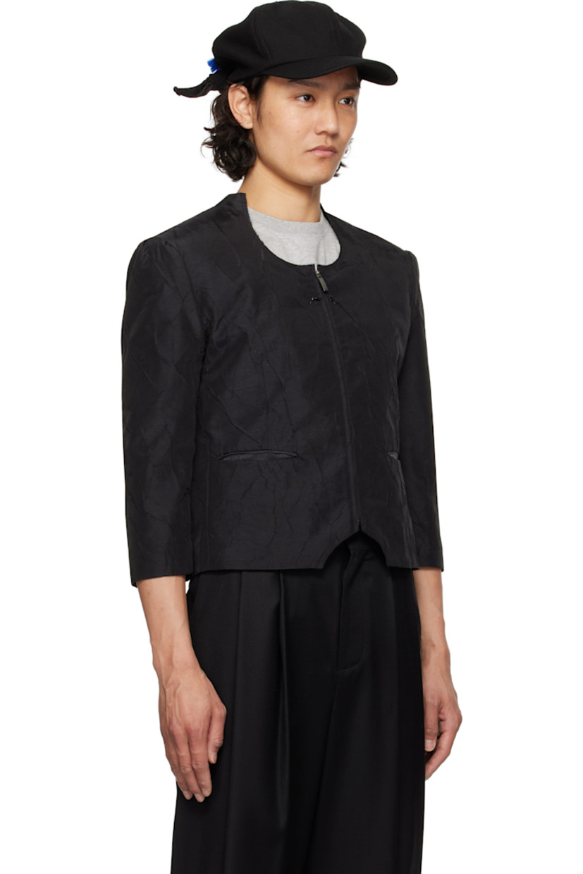 Slim-fit crinkled plain-woven nylon-blend blazer.

· Raw edge at modified scoop neck
· Zip closure 
· Hook-eye fastening at chest
· Darts at front and back
· Welt pockets
· Cutout at front hem
· Gathering at padded shoulders
· Frayed flag with topstitching at back
· Welt pocket at interior
· Full satin lining

Supplier color: Noir