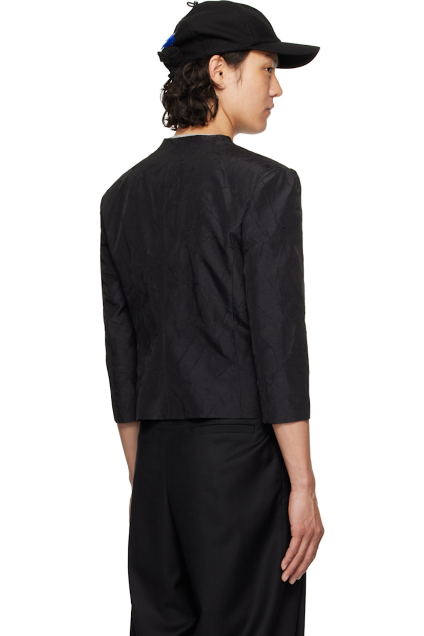 Slim-fit crinkled plain-woven nylon-blend blazer.

· Raw edge at modified scoop neck
· Zip closure 
· Hook-eye fastening at chest
· Darts at front and back
· Welt pockets
· Cutout at front hem
· Gathering at padded shoulders
· Frayed flag with topstitching at back
· Welt pocket at interior
· Full satin lining

Supplier color: Noir