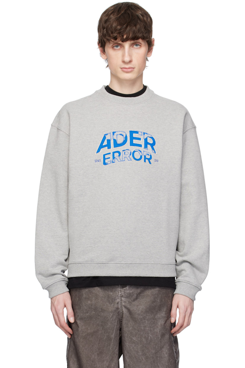 Oversized French terry sweatshirt.

· Rib-knit crewneck, hem, and cuffs
· Embroidered logo appliqués at front
· Dropped shoulders
· Logo topstitching at back

Supplier color: Grey
