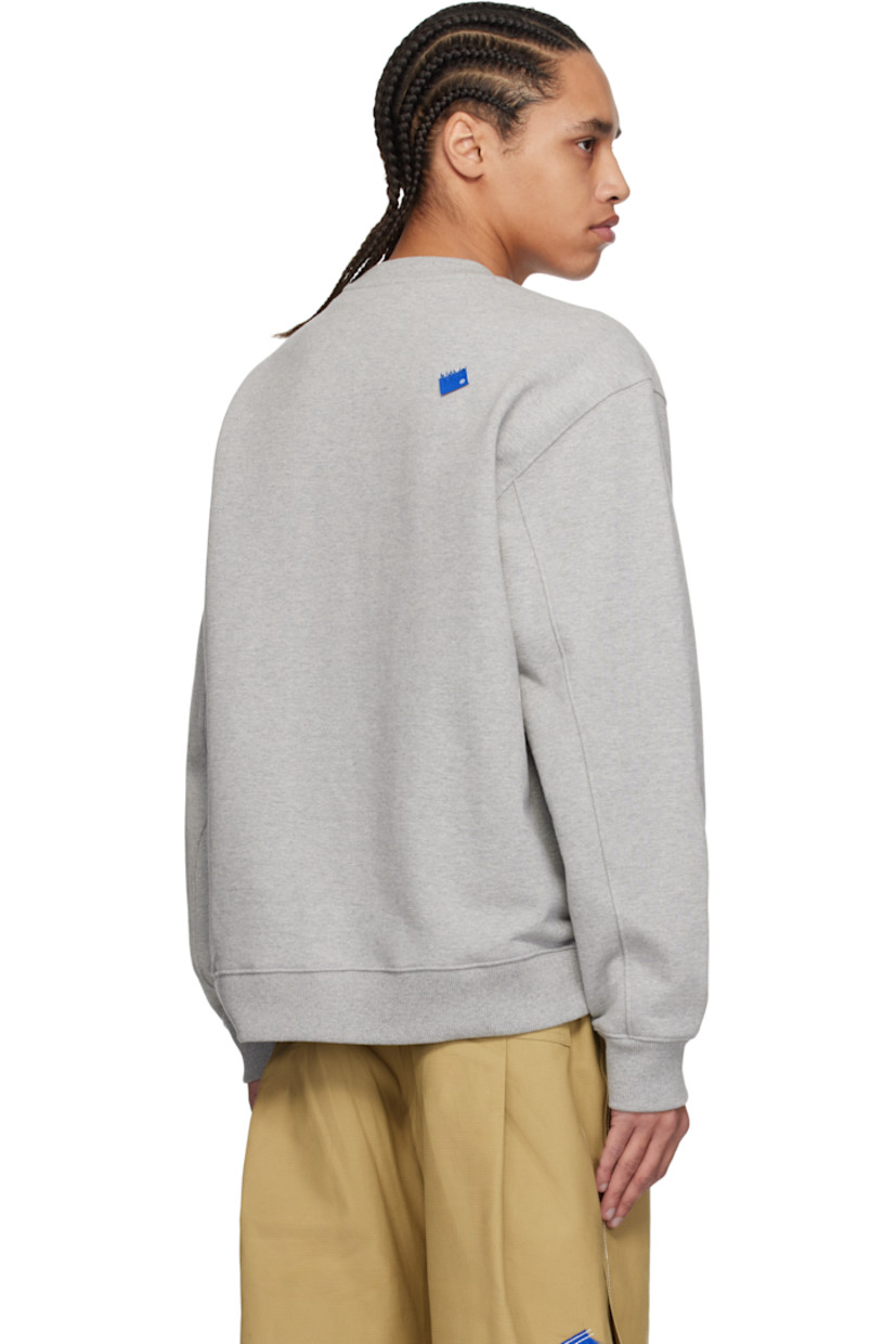 French terry sweatshirt.

· Rib-knit crewneck, hem, and cuffs
· Embroidered logo patch at chest
· Dropped shoulders
· Logo flag with topstitched logo at back

Part of the Significant collection.

Supplier color: Grey