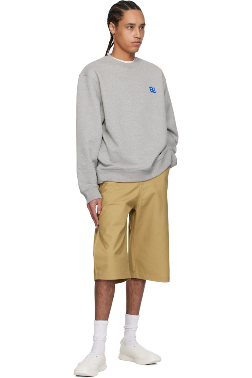 French terry sweatshirt.

· Rib-knit crewneck, hem, and cuffs
· Embroidered logo patch at chest
· Dropped shoulders
· Logo flag with topstitched logo at back

Part of the Significant collection.

Supplier color: Grey