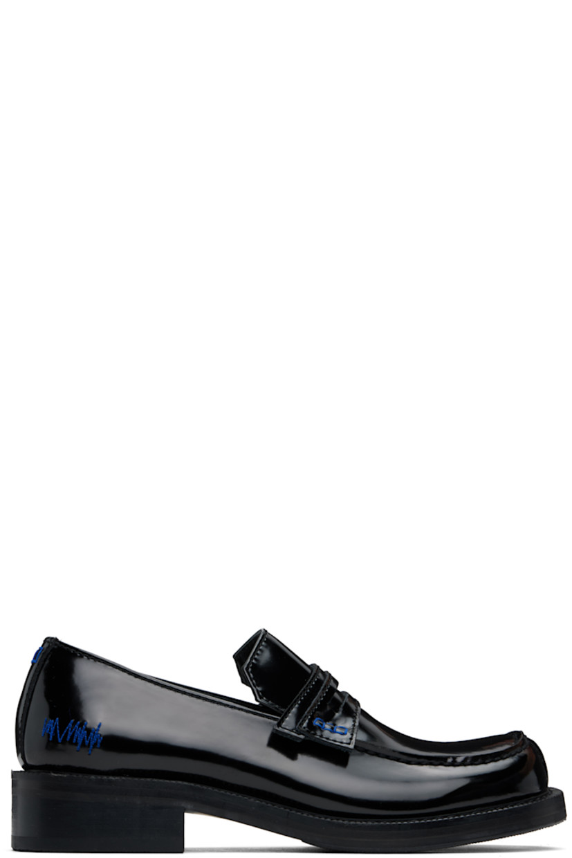 Patent leather loafers in black.

· Square moc toe
· Strap with cutout at vamp
· Logo embroidered at outer side
· Embroidered detailing at heel collar
· Buffed leather lining
· Serrated edge and topstitching at welt
· Stacked leather heel with rubber injection
· Leather sole
· Heel: H1.5"

Supplier color: Black