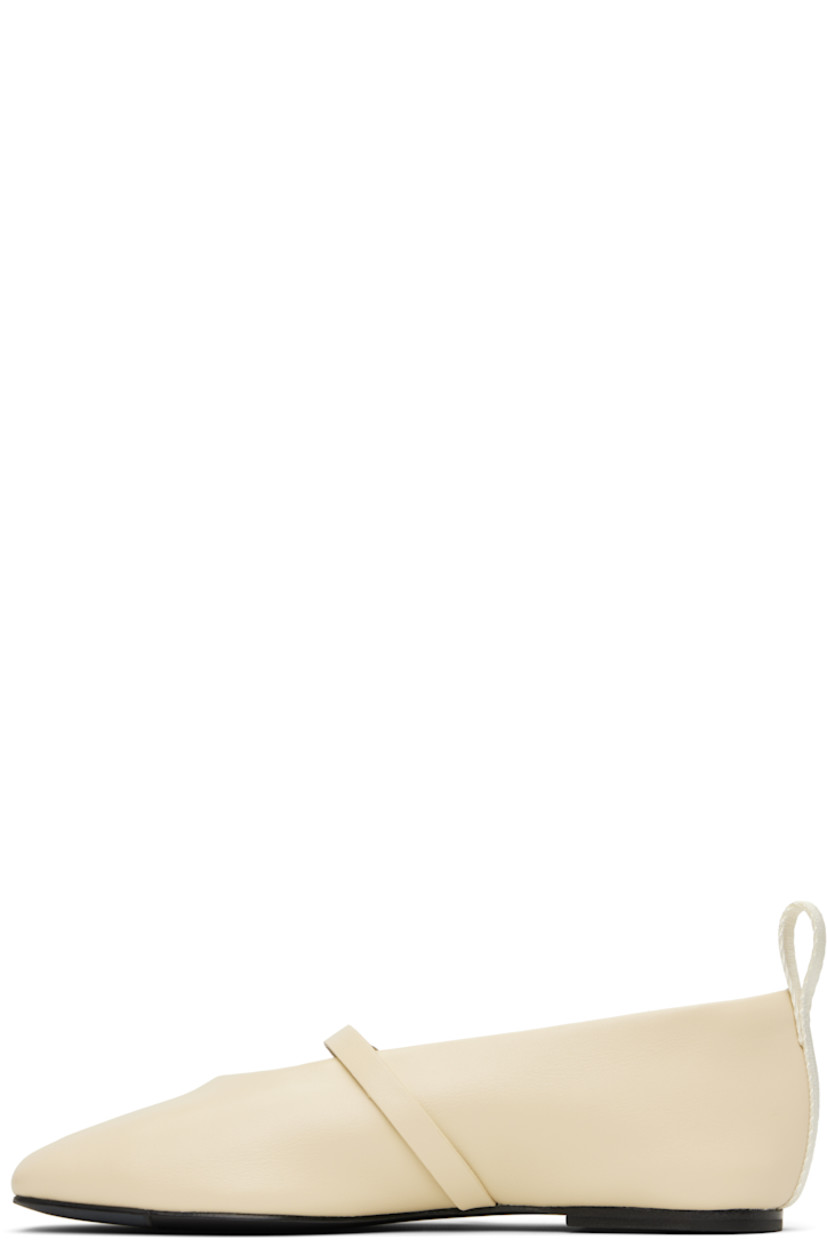 Nappa leather Mary Jane-style ballerina flats in off-white.

· Square toe
· Pin-buckle strap and D-rings at vamp
· Logo-embossed webbing pull-loop at heel 
· Padded OrthoLite® Lazy-Hybrid™ footbed
· Leather sole with rubber injections
· Gold-tone hardware

Supplier color: Greige