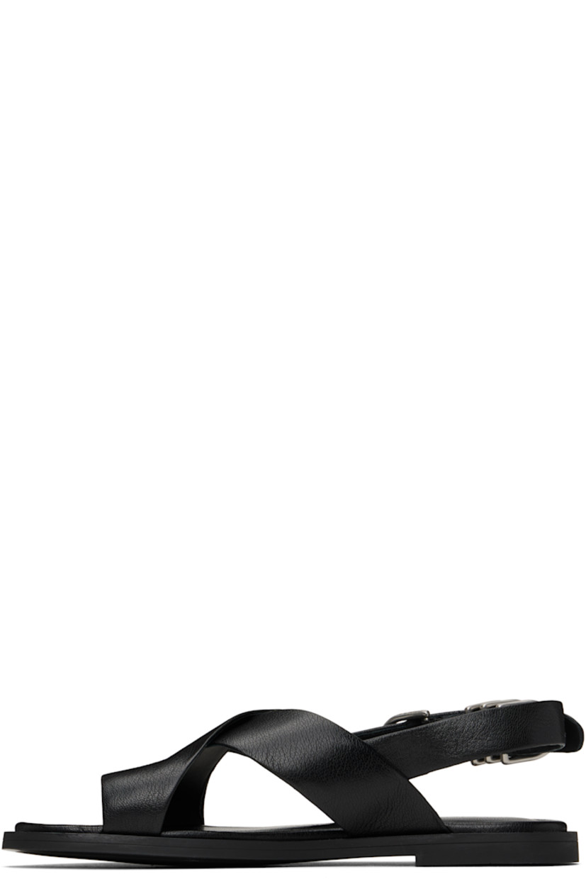 Grained goatskin flat sandals in black.

· LWG-certified
· Open toe
· Crisscrossing straps with integrated toe strap 
· D-rings at pin-buckle ankle strap
· OrthoLite® Lazy-Hybrid™ and OrthoLite® Recycled footbed
· Rubber sole

Supplier color: Black