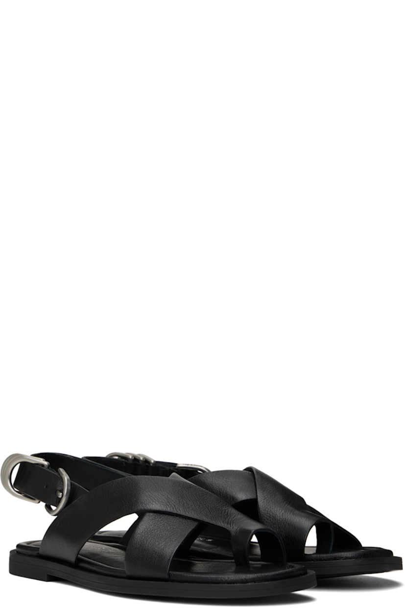 Grained goatskin flat sandals in black.

· LWG-certified
· Open toe
· Crisscrossing straps with integrated toe strap 
· D-rings at pin-buckle ankle strap
· OrthoLite® Lazy-Hybrid™ and OrthoLite® Recycled footbed
· Rubber sole

Supplier color: Black