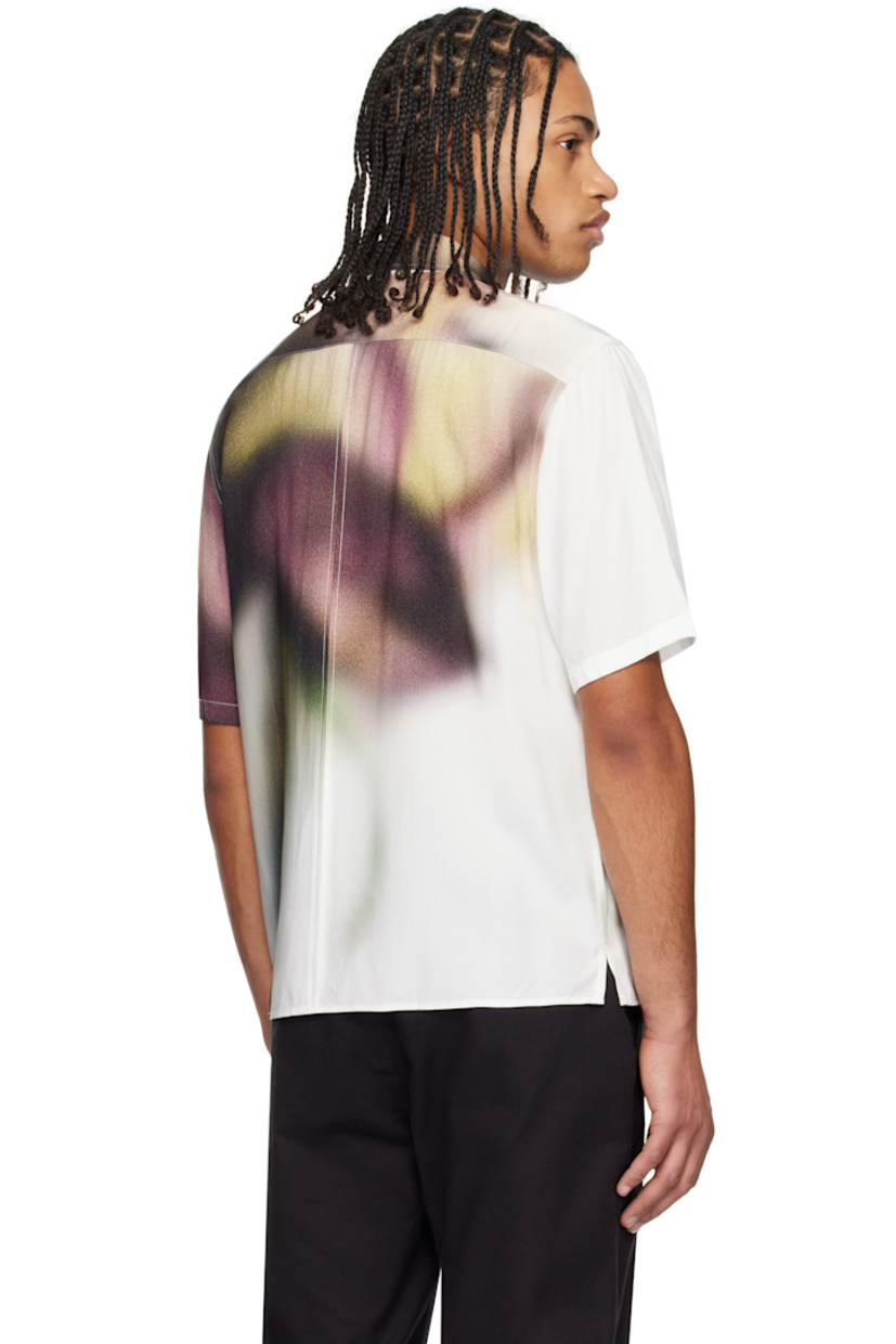 Viscose poplin shirt. Graphic printed throughout.

· Spread collar
· Button closure
· Logo patch at button placket
· Vented side seams
· Locker loop at back collar

Supplier color: White red rose