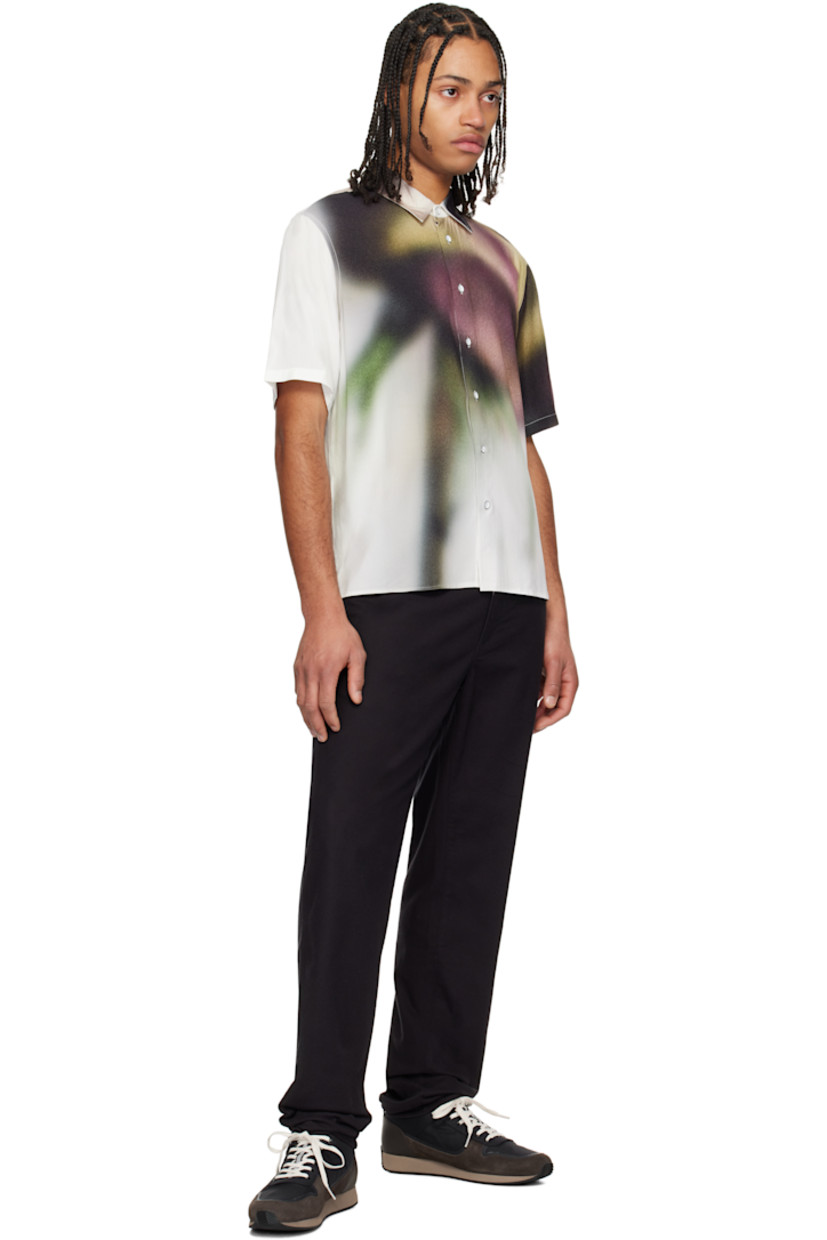 Viscose poplin shirt. Graphic printed throughout.

· Spread collar
· Button closure
· Logo patch at button placket
· Vented side seams
· Locker loop at back collar

Supplier color: White red rose