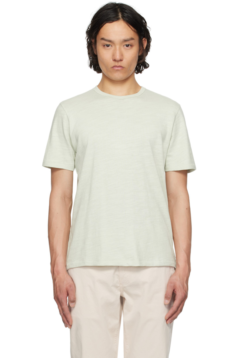Cotton jersey T-shirt.

· Raw edge at crewneck
· Logo embroidered at side hem
· Central seam at back
· White stitch at back collar

Supplier color: Light teal