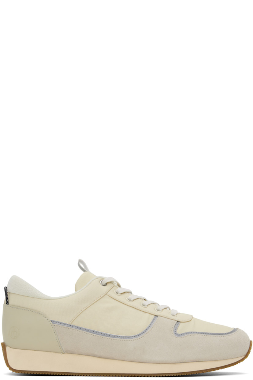 Low-top paneled ripstop, suede, and buffed leather sneakers in off-white and gray.

· Reflective trim throughout
· Lace-up closure
· Pull-loop at tongue
· Padded collar
· Embossed logo at outer side
· Elasticized pull-loop at heel counter
· OrthoLite® Lazy-Hybrid™ and OrthoLite® Recycled insole
· Mesh lining
· Treaded rubber sole

Supplier color: Turtledove