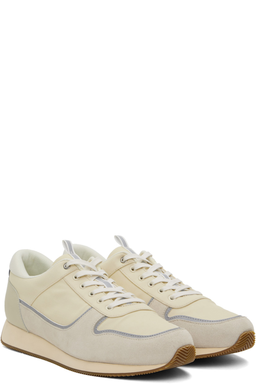 Low-top paneled ripstop, suede, and buffed leather sneakers in off-white and gray.

· Reflective trim throughout
· Lace-up closure
· Pull-loop at tongue
· Padded collar
· Embossed logo at outer side
· Elasticized pull-loop at heel counter
· OrthoLite® Lazy-Hybrid™ and OrthoLite® Recycled insole
· Mesh lining
· Treaded rubber sole

Supplier color: Turtledove