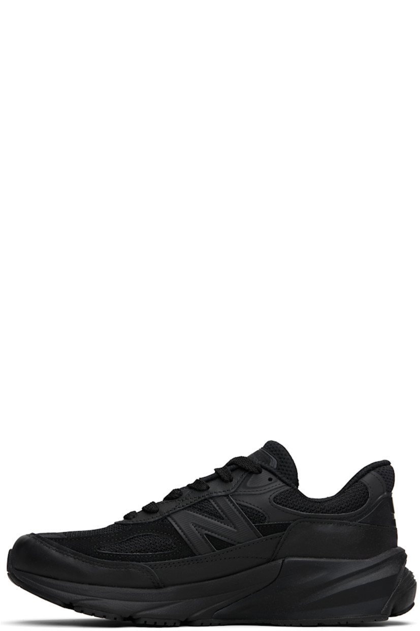 Low-top mesh and buffed leather sneakers.

· Rubberized trim throughout 
· Lace-up closure
· Logo patch at padded tongue
· Padded collar
· Logo appliqué at sides
· Text stamp at outer side
· Textured ENCAP® FuelCell rubber sole

Part of the Comme des Garçons Homme x New Balance collaboration.

Supplier color: Black