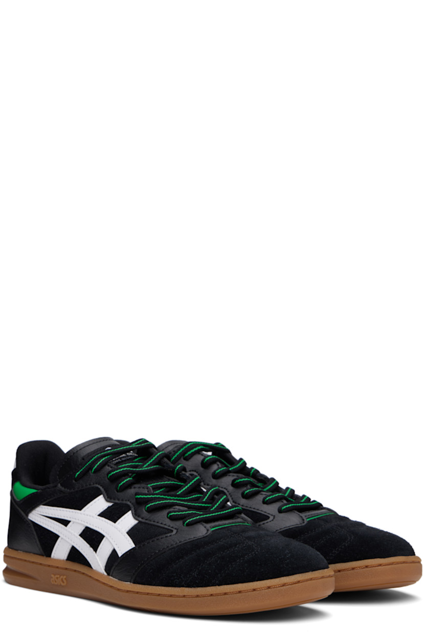 Low-top suede and grained leather sneakers in black. 

· Quilted detailing at toe
· Lace-up closure
· Logo patch at padded tongue
· Padded collar
· Signature stripes at sides
· Logo printed at heel tab
· Mesh lining 
· Logo embossed at rubber midsole
· Treaded rubber sole

Part of the Comme des Garçons Homme Deux x ASICS collaboration. 

Supplier color: Black