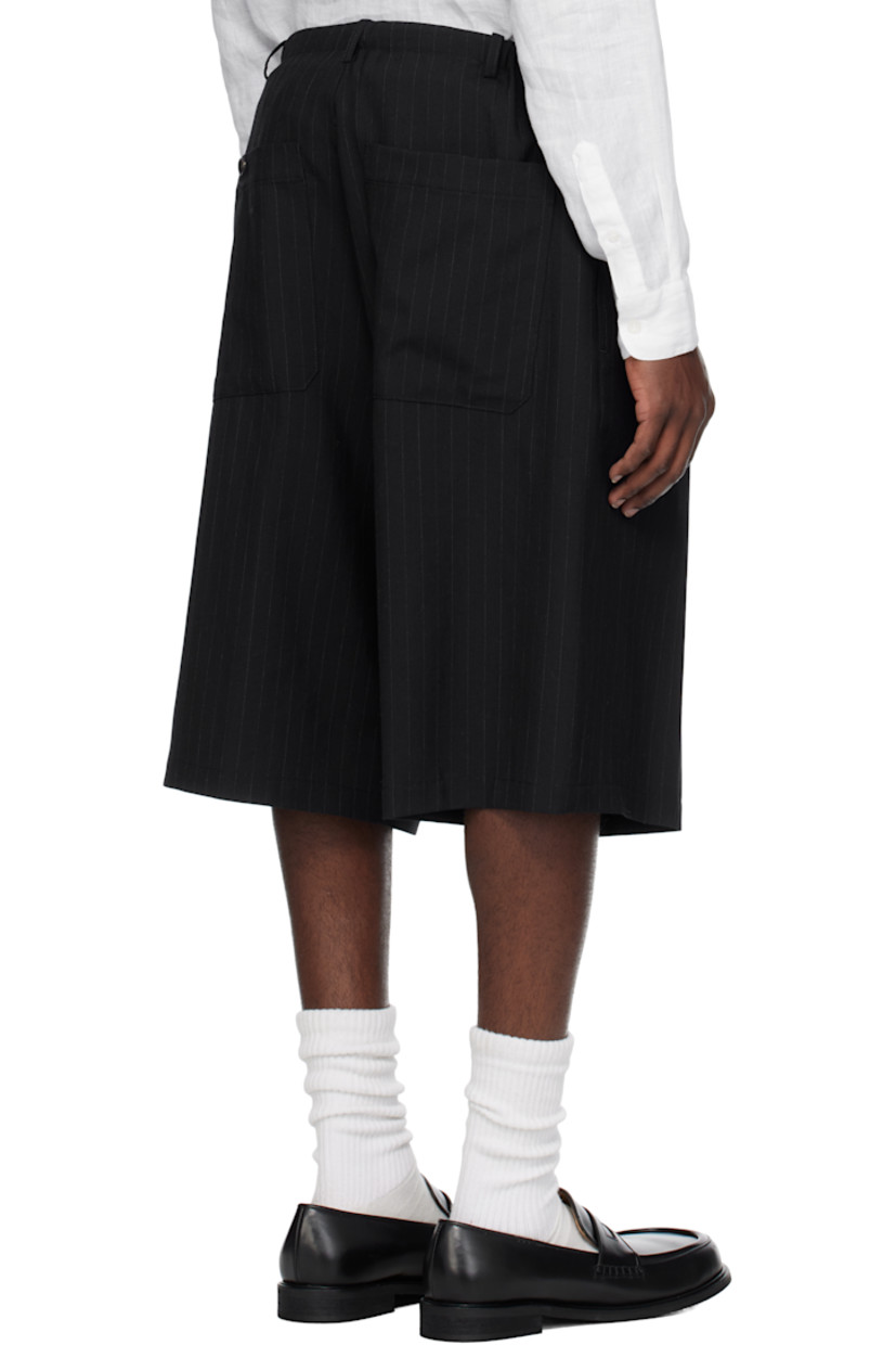 Wool barathea shorts. Pinstripes throughout.

· Belt loops and integrated self-tie belt
· Four-pocket styling
· Zip fly
· Pleats at front
· Creased legs
· Partially lined

Supplier color: Navy stripe