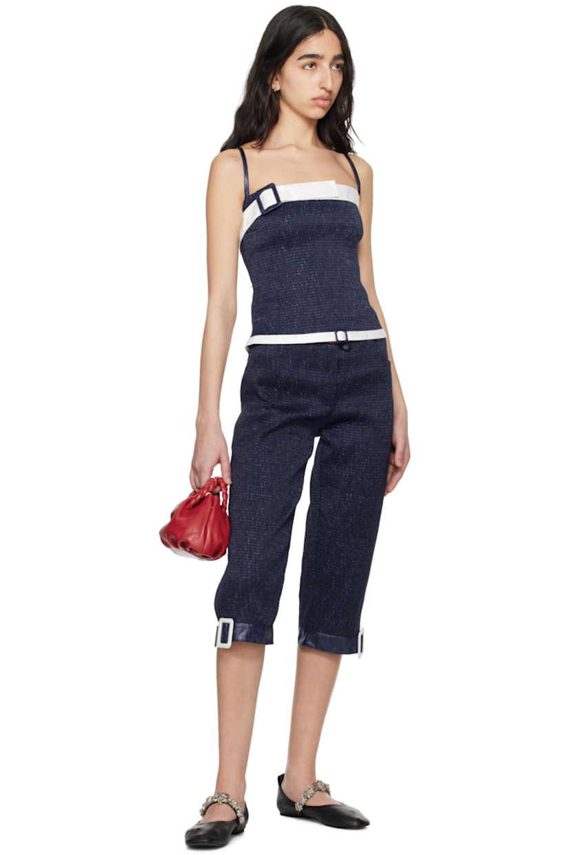 Cotton brocade trousers. Shirring throughout. 

· Two-pocket styling
· Zip fly
· Cinch strap at cuffs

Supplier color: Marine
