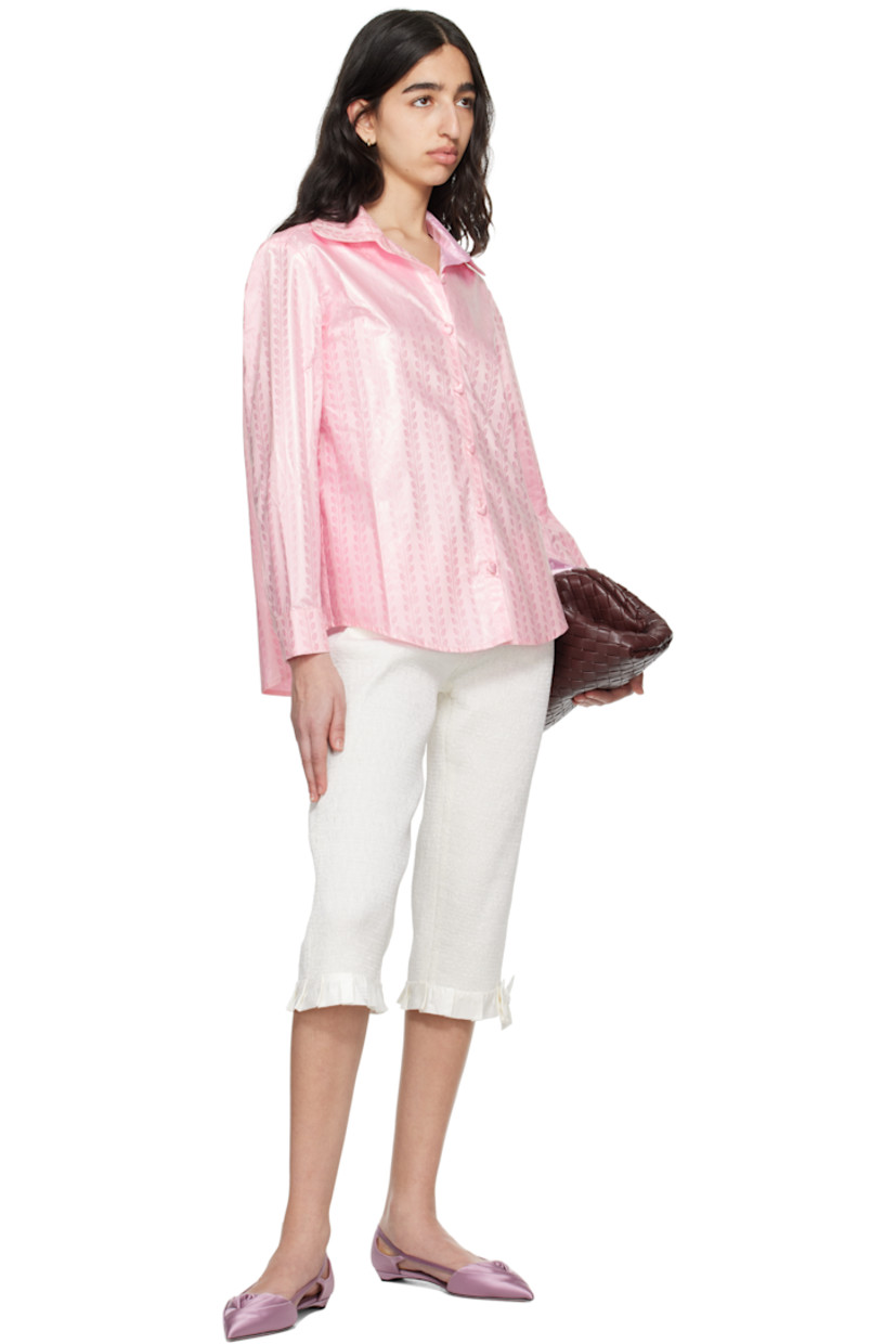 Cotton brocade shirt. Jacquard pattern throughout.

· Spread collar
· Button closure
· Shirttail hem 
· Pleated barrel cuffs
· Box pleat at back yoke
· Graphic hardware

Supplier color: Sweet pink