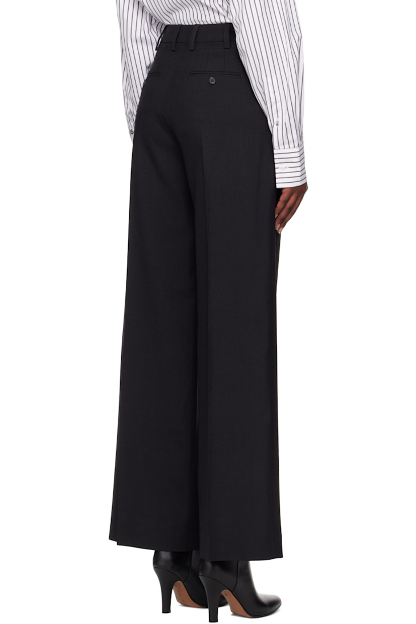Wide-leg wool-blend barathea trousers. 

· High-rise
· Belt loops
· Four-pocket styling
· Zip fly
· Pleats at front
· Central creases at front and back

Supplier color: Black