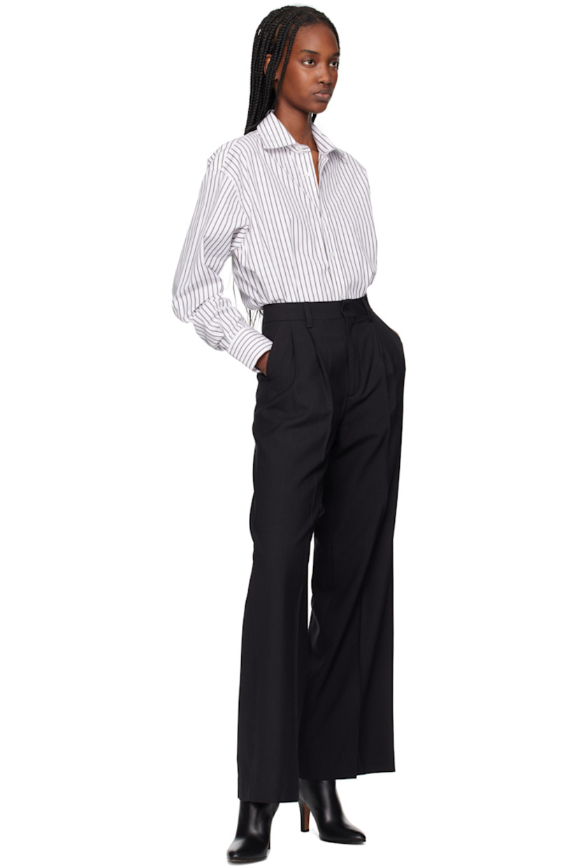 Wide-leg wool-blend barathea trousers. 

· High-rise
· Belt loops
· Four-pocket styling
· Zip fly
· Pleats at front
· Central creases at front and back

Supplier color: Black