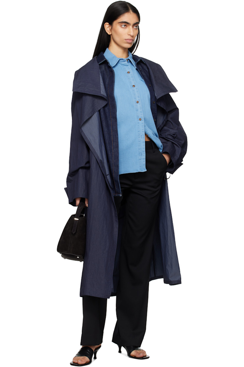 Bootcut stretch polyester- and wool-blend twill trousers.

· High-rise
· Belt loops
· Three-pocket styling
· Zip-fly
· Creased legs

Supplier color: Black