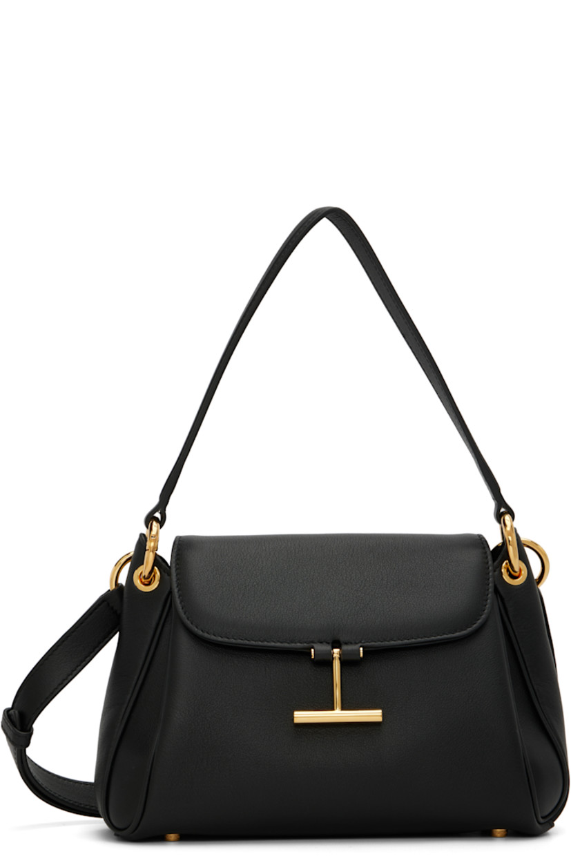 Grained calfskin shoulder bag.

· Detachable carry handle
· Adjustable and detachable crossbody strap
· Patch pocket at back face
· Bumper studs at base
· Logo hardware at magnetic flap
· Patch pocket at interior
· Faux-suede lining
· Logo-engraved gold-tone hardware
· H6.5" x W9" x D3"

Supplier color: Black