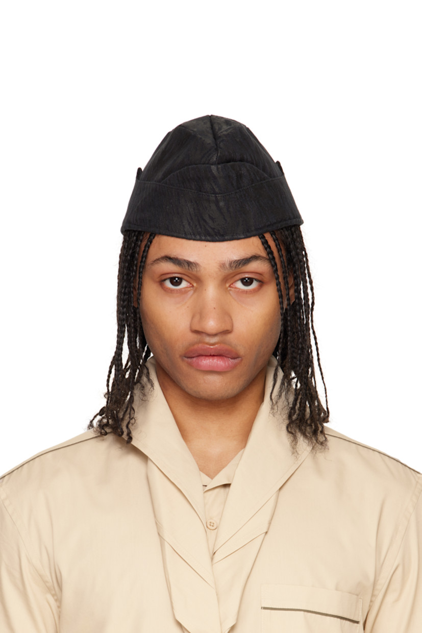 Cotton canvas hat in black.

· Graphic pattern printed throughout
· Full satin lining

Supplier color: Black Camouflage