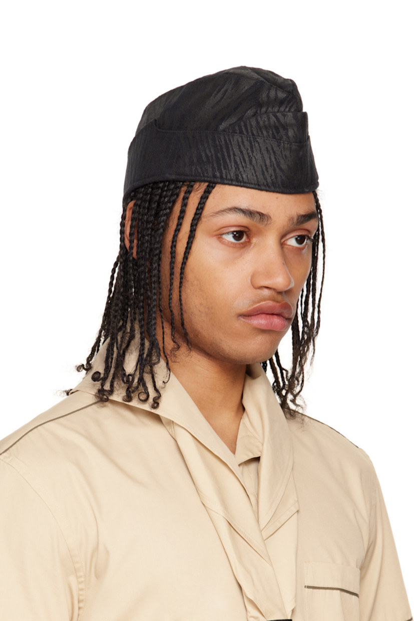 Cotton canvas hat in black.

· Graphic pattern printed throughout
· Full satin lining

Supplier color: Black Camouflage