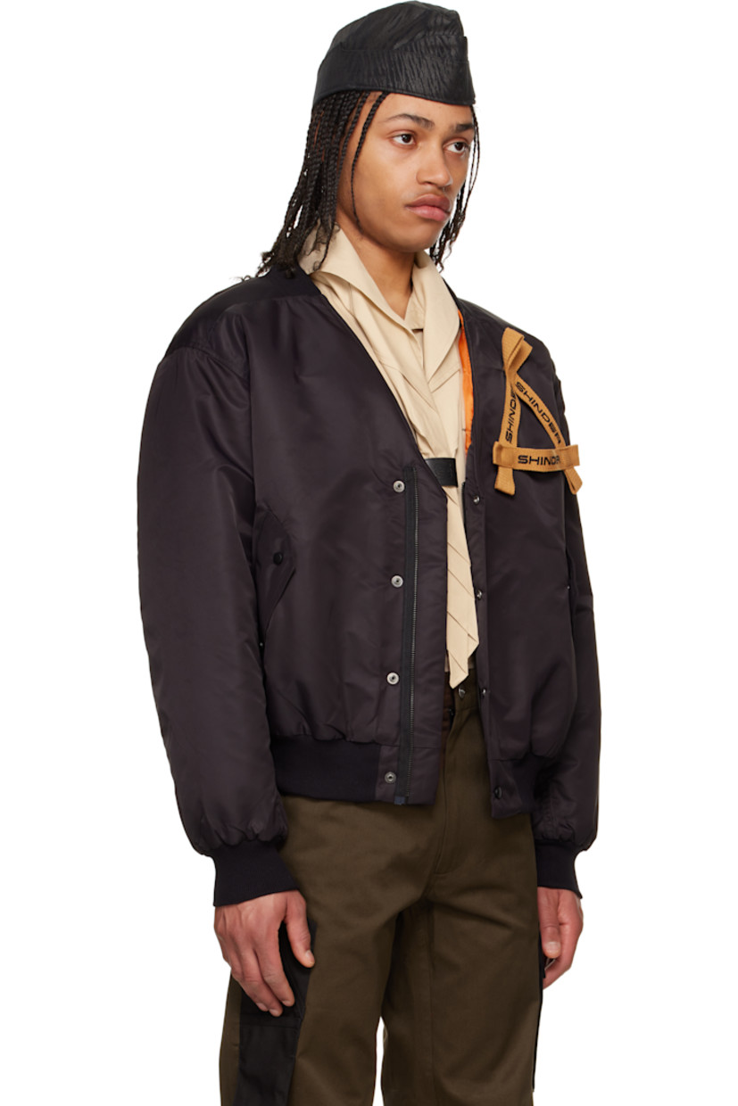 Nylon taffeta bomber jacket.

· Partially rib-knit V-neck
· Zip closure with press-stud placket
· Logo embroidered grosgrain trim at chest
· Flap pockets
· Rib-knit hem and cuffs
· Welt pocket at interior
· Full satin lining

Supplier color: Black
