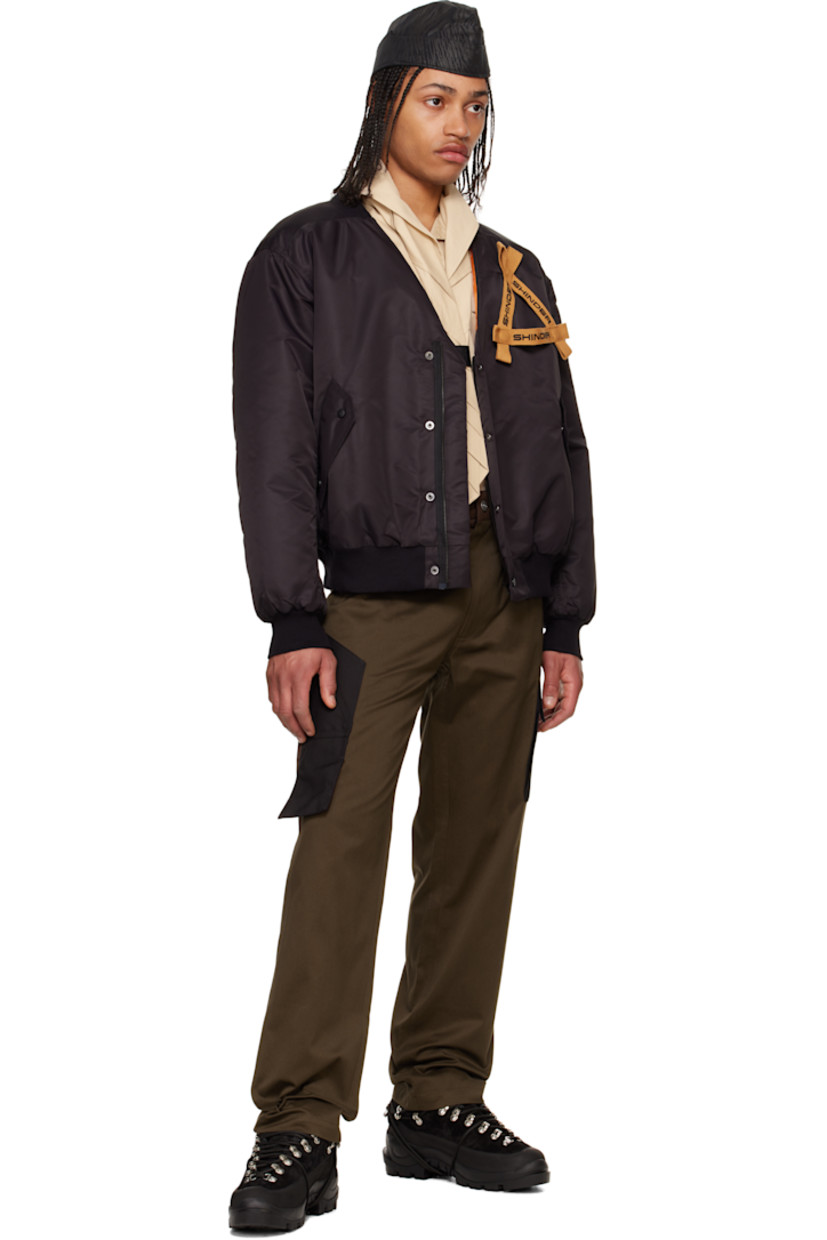 Nylon taffeta bomber jacket.

· Partially rib-knit V-neck
· Zip closure with press-stud placket
· Logo embroidered grosgrain trim at chest
· Flap pockets
· Rib-knit hem and cuffs
· Welt pocket at interior
· Full satin lining

Supplier color: Black
