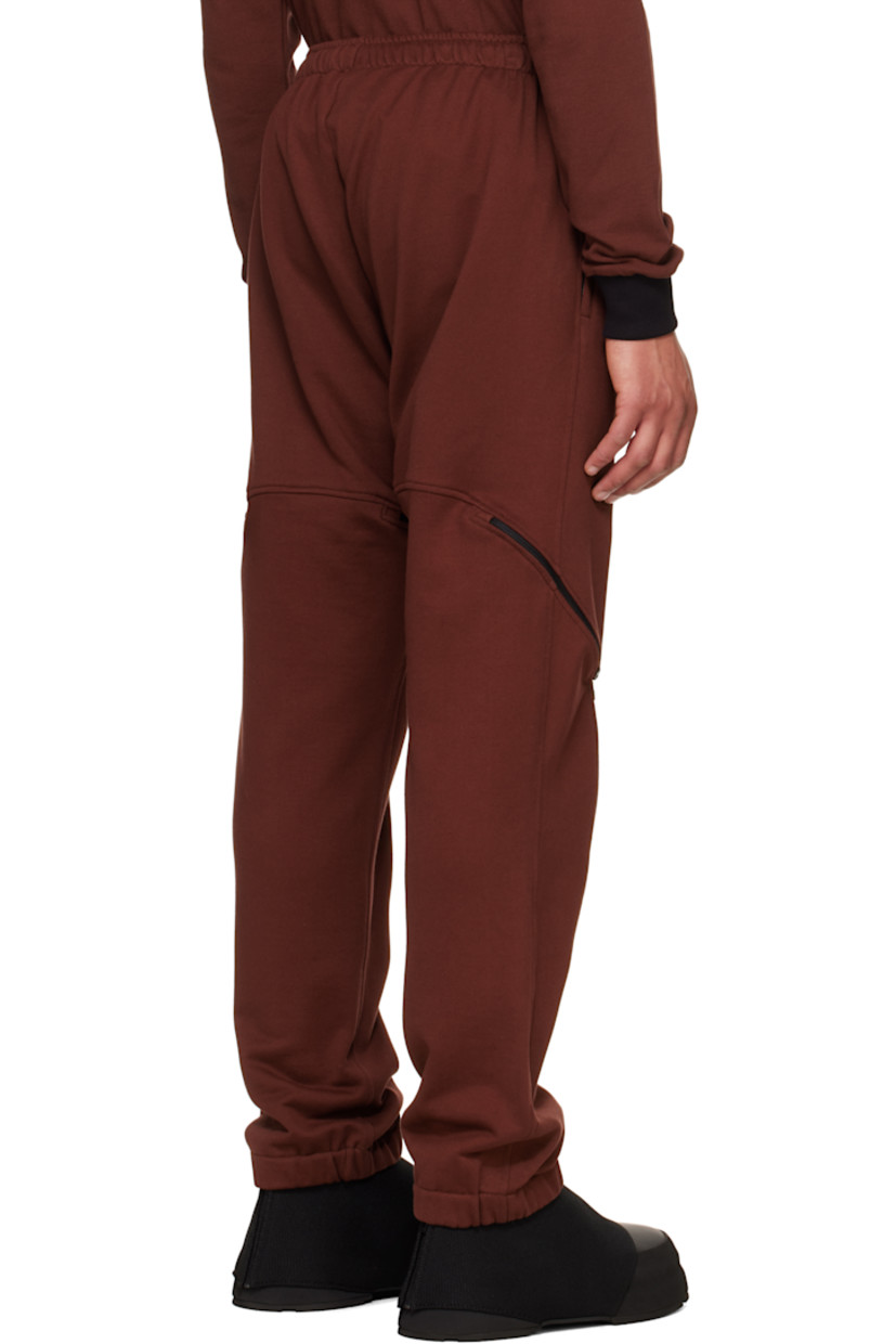 French terry sweatpants.

· Concealed drawstring at elasticized waistband
· Two-pocket styling
· Logo graphic printed at front
· Zip mesh expansion panel at legs
· Elasticized cuffs

Supplier color: Port/Black