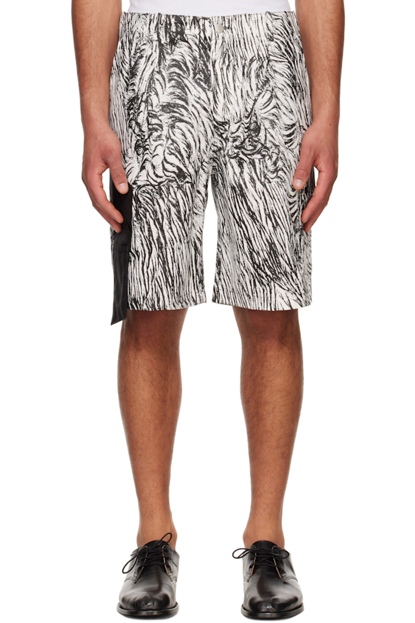Cotton twill shorts. Camouflage pattern printed throughout.

· Belt loops
· Three-pocket styling
· Zip-fly
· Pleats at front
· Cordura® nylon canvas patch pockets at outseam
· Cargo pocket at outseam
· Logo-engraved silver-tone hardware

Supplier color: Infared camouflage