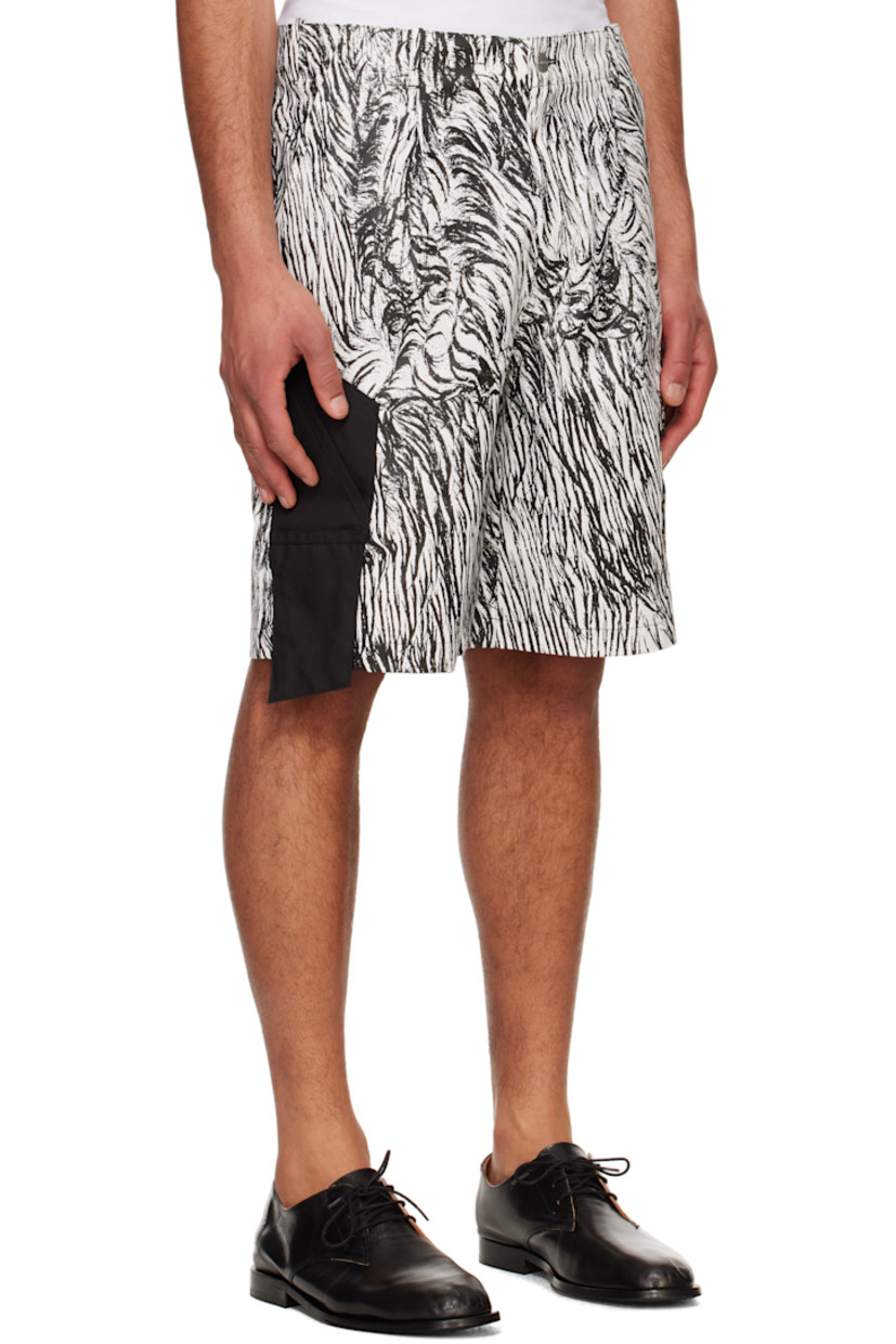 Cotton twill shorts. Camouflage pattern printed throughout.

· Belt loops
· Three-pocket styling
· Zip-fly
· Pleats at front
· Cordura® nylon canvas patch pockets at outseam
· Cargo pocket at outseam
· Logo-engraved silver-tone hardware

Supplier color: Infared camouflage