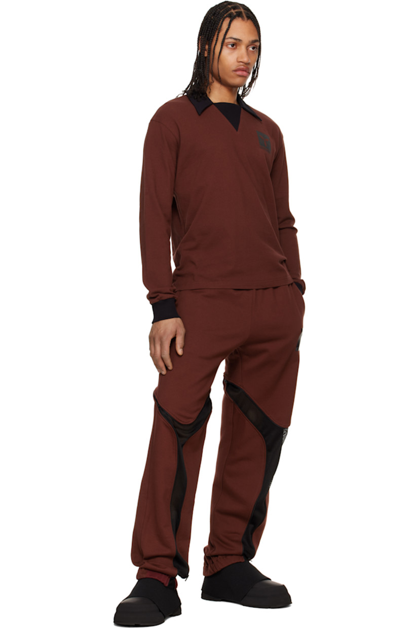 Cotton piqué polo.

· Rib-knit spread collar, placket, and cuffs
· Logo graphic printed at chest

Supplier color: Port
