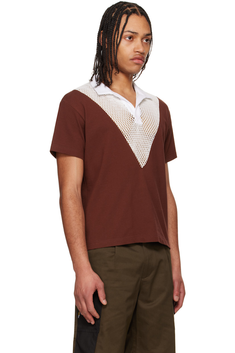 Cotton piqué and mesh polo.

· Paneled construction
· Rib-knit spread collar and open placket

Supplier color: White/Port