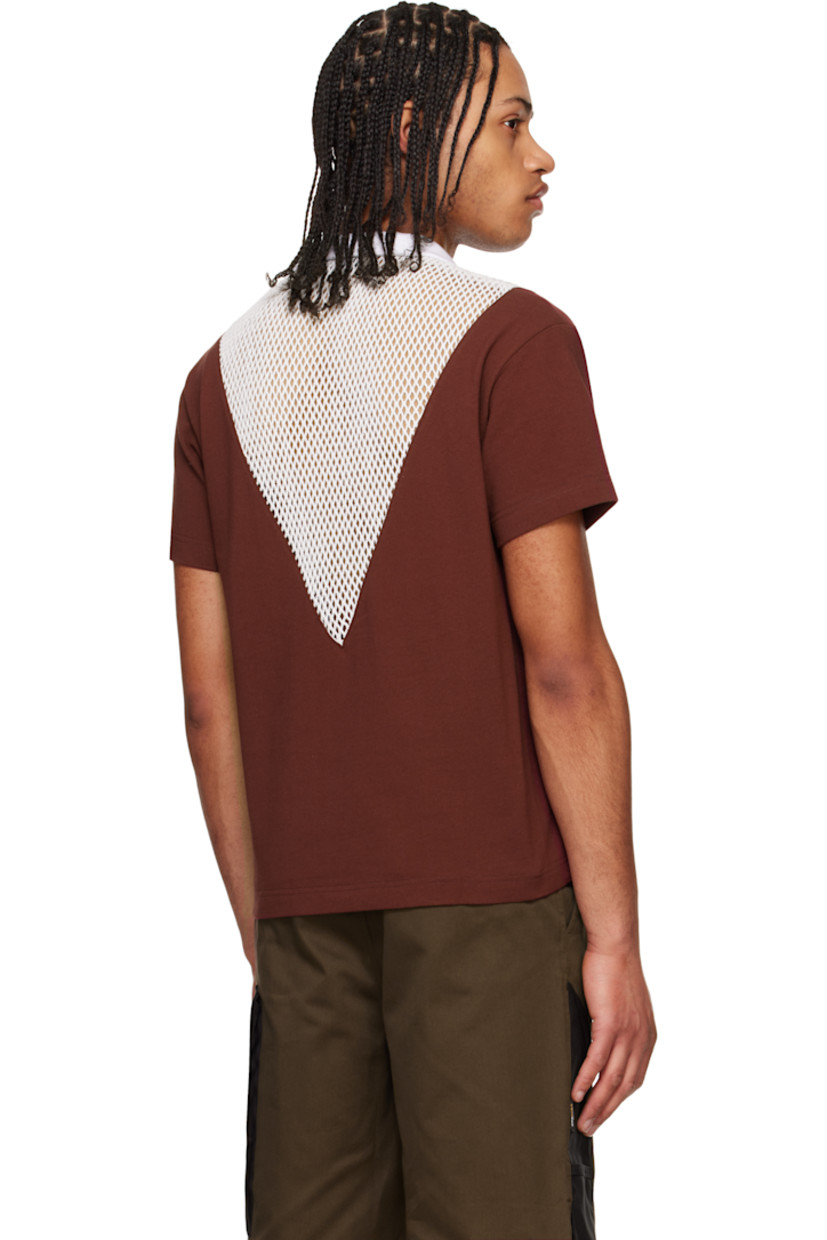 Cotton piqué and mesh polo.

· Paneled construction
· Rib-knit spread collar and open placket

Supplier color: White/Port