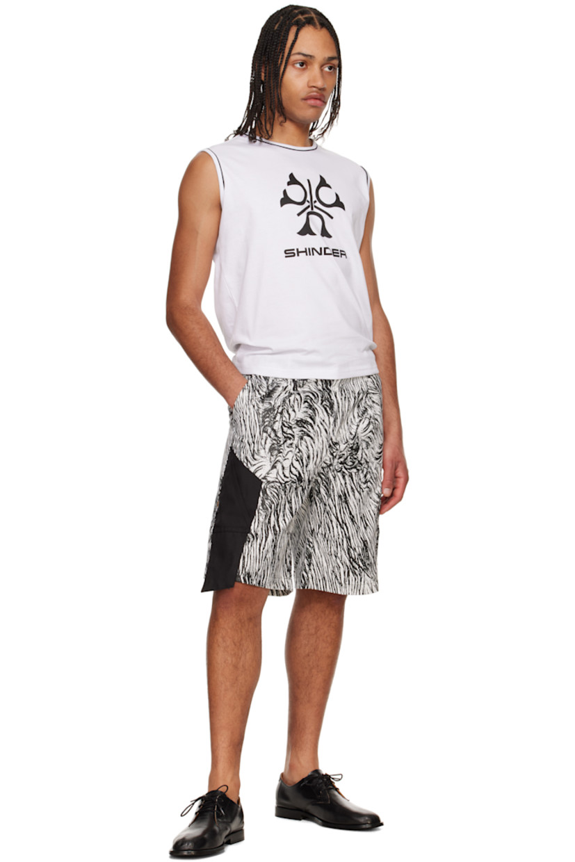 Cotton jersey tank top. 

· Piping at crewneck and armscyes
· Logo graphic printed at front

Supplier color: White