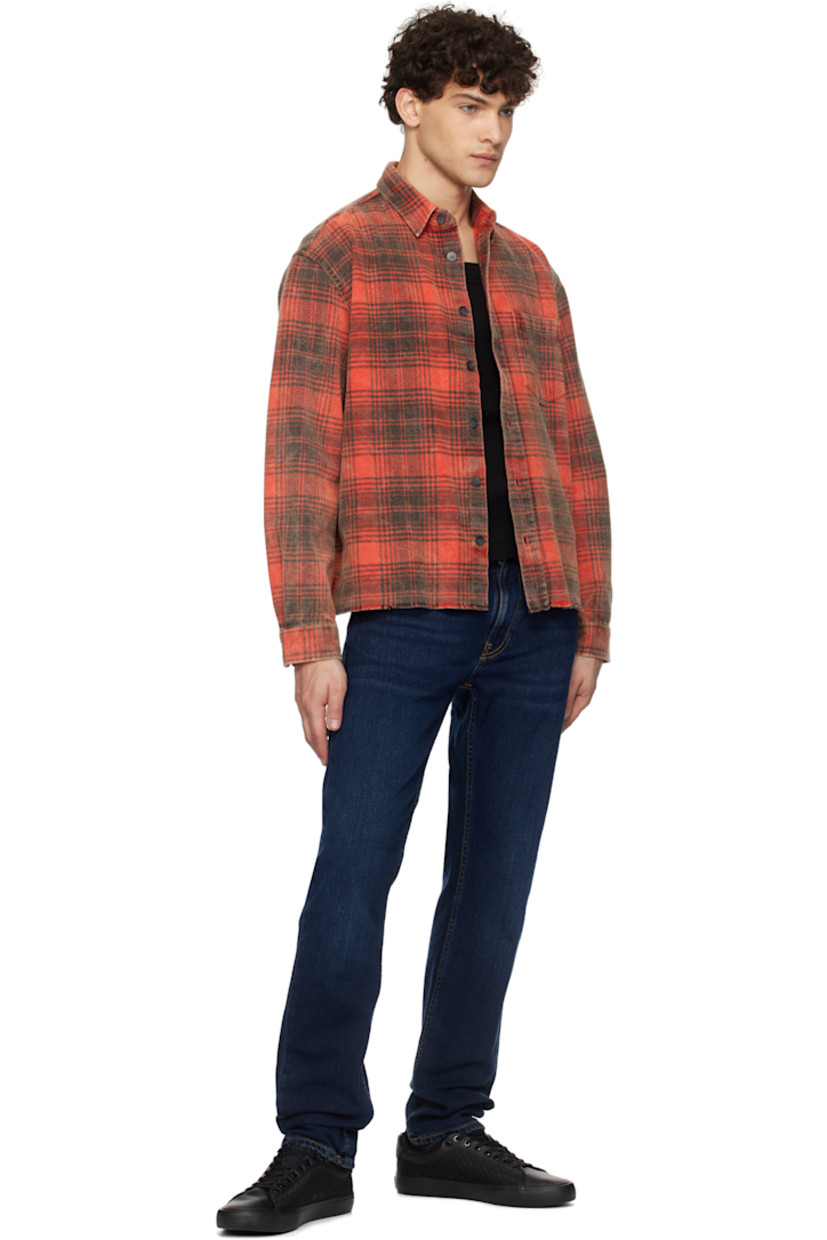 Slim-fit and tapered 12 oz stretch denim jeans. Fading and whiskering throughout. 

· Mid-rise
· Belt loops
· Five-pocket styling
· Zip-fly
· Jacron logo patch at back waistband
· Logo patch at back pocket
· Topstitching at back pockets
· Logo-engraved brass-tone hardware
· Contrast stitching in tan

Supplier color: New ink